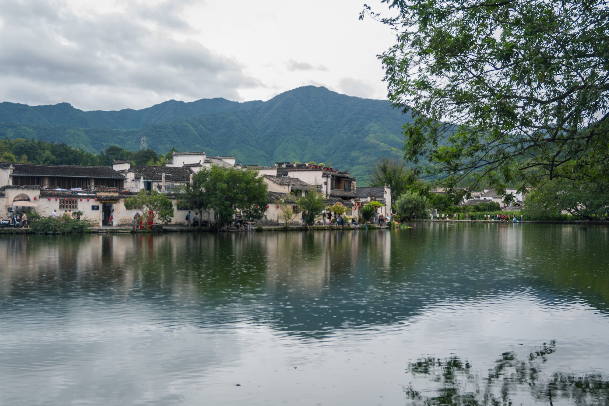 Traditional houses reflected in the water at Hongcun
